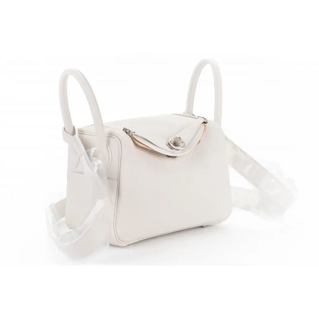 Hermes’ Lindy Mini Taurillon Clemence “White”