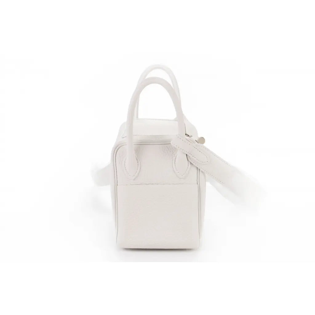 Hermes’ Lindy Mini Taurillon Clemence “White”